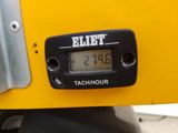 a close up of a clock on the back of a motorcycle