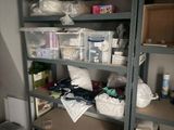 a room with a lot of boxes and containers on the shelves