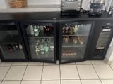 two glass doors on the side of the counter
