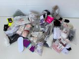 a pile of assorted items sitting on the floor