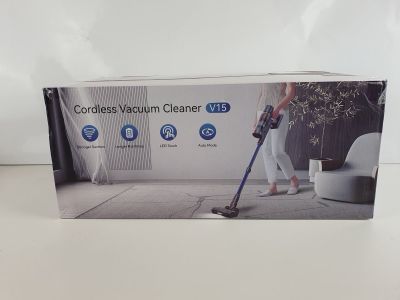 La boîte de l'aspirateur sans fil est ouverte sur la table