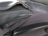 a close up of a piece of luggage that has been scratched