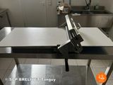 a machine that is sitting on a table in a kitchen