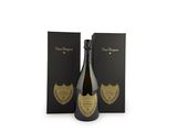 a bottle of champagne in front of a black box