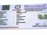 a picture of a business card with a pair of earrings on it