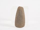 a small rock that is sitting on a white surface