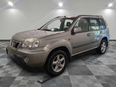 a picture of a silver suv parked in a garage