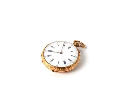 une montre de poche en or avec des chiffres romains