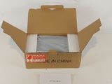 a box with a picture inside of it sitting on a table