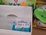 a box of tea next to a package of tea