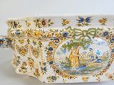a large bowl that has a painting on it