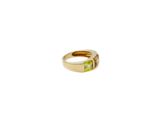 an image of a gold ring with a peridot stone