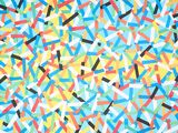 colorful confetti sprinkles on a blue background
