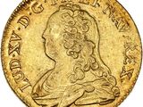 l'image d'une pièce d'or sur laquelle figure une tête de femme