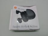packaging of a pair of headphones in a box on a table