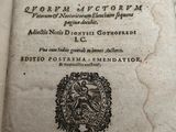 an old book with a picture of a lion on it