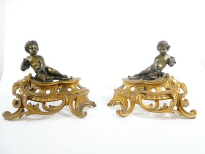pair of antique bronze figurines of a boy and a girl sitting on a bench