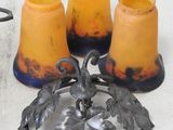 three candles that are sitting on a table
