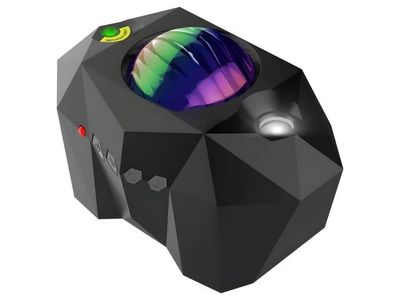 un gros plan d'un objet noir sur lequel se reflète une lumière arc-en-ciel