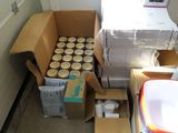 a box of cups and a box of boxes in a room