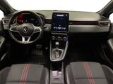 a picture of the interior of a car with a touch screen