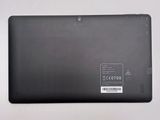 the back of a black laptop with a sticker on it ' s side