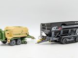 two toy trucks that are next to each other on a white surface