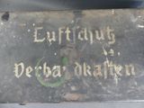 a metal box with a sign on it that says enfittings derba ' s health