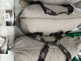 many bags of luggage that are stacked on top of each other