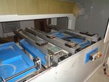 an image of a machine that is working on a piece of equipment