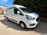 a white van parked on the side of the road
