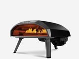 un gros plan d'un four à pizza sur fond blanc