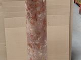 a marble column with a clock on top of it