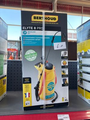 a box with a sprayer on it on display in a store