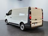 a white van that is parked in a room