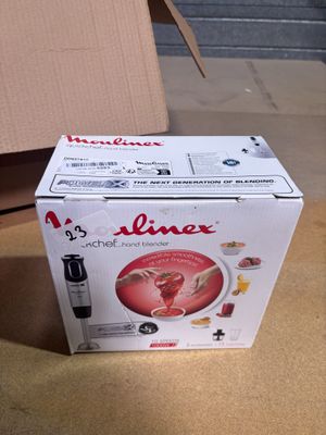 a box of food sitting on the floor next to a cardboard box