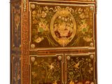 a cabinet that has been decorated with flowers and birds