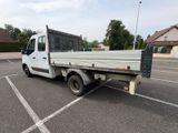 a white truck that is parked in a parking lot