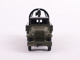 a toy army jeep with a canopy on the back of it