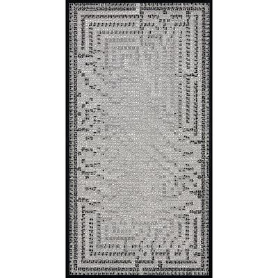 un tapis noir et blanc avec un motif