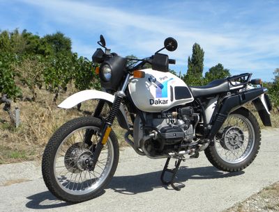 a motorcycle that is parked on the side of the road