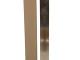 a tall metal object on a stand with a white background
