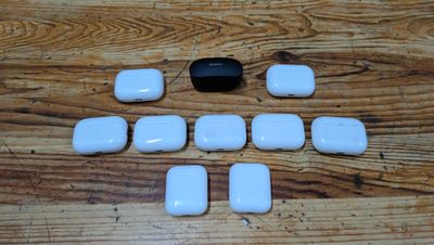 a wooden table with a bunch of white objects on it