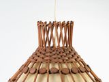 a lamp that is made out of sticks and wood