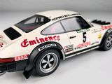 a toy car that is sitting on a white surface
