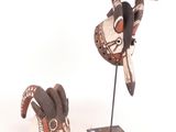 Il s'agit de deux sculptures d'animaux réalisées en bois et en métal.