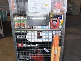 a metal cart with many items in it in a warehouse