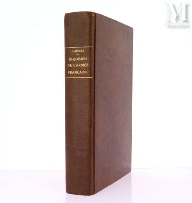 a brown book sitting on top of a white table