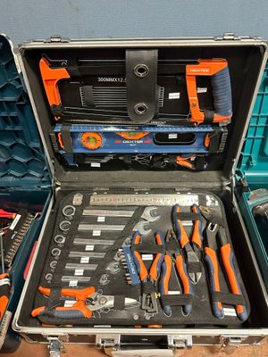 many tools in a tool case on a table