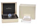 an image of a watch in a box with a card in it